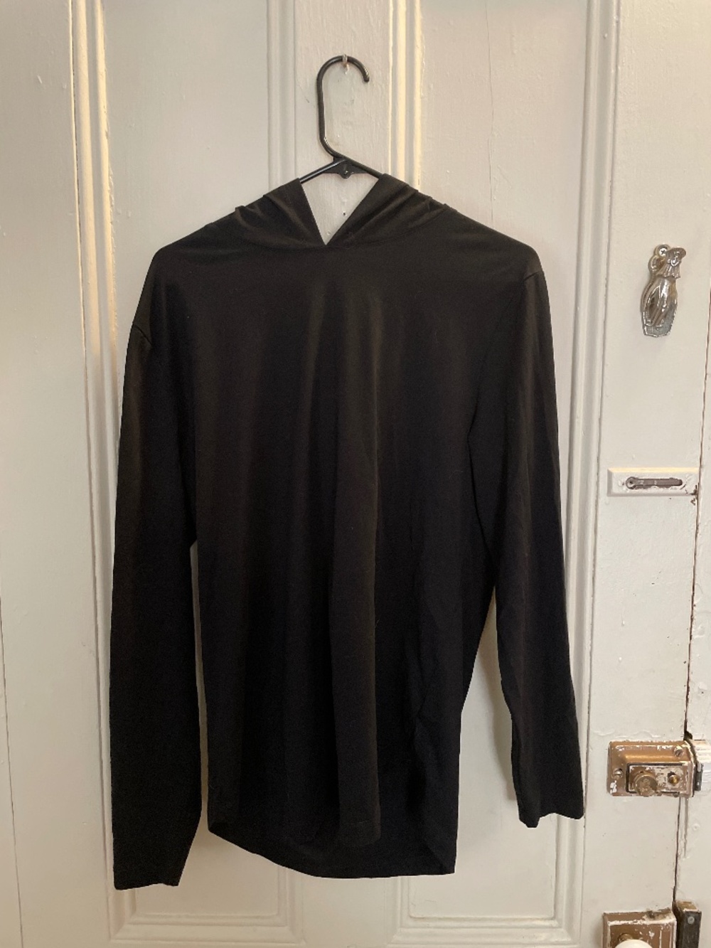 Cuts clothing curve hem hooded t-shirt